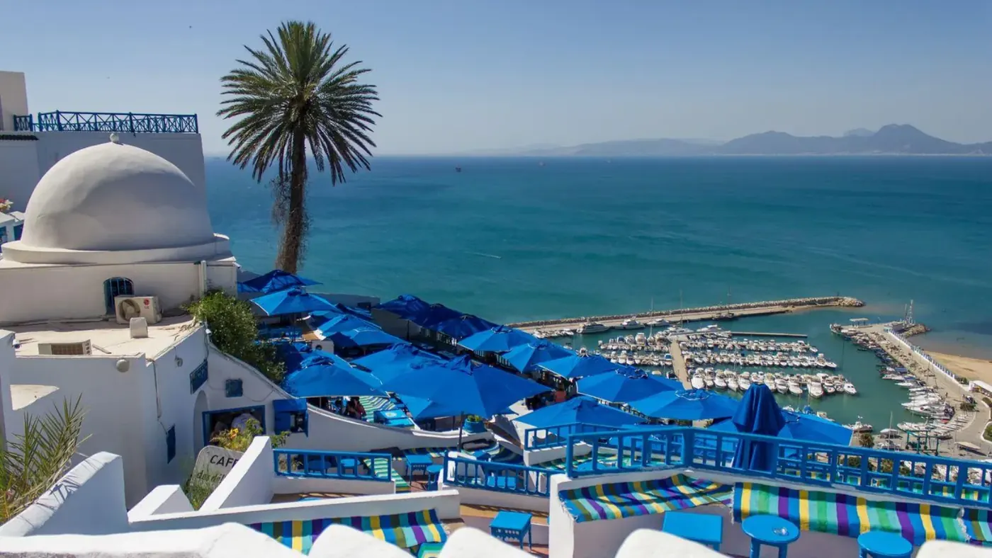 Blue parasols and white domes above the Sidi Bou Said marina