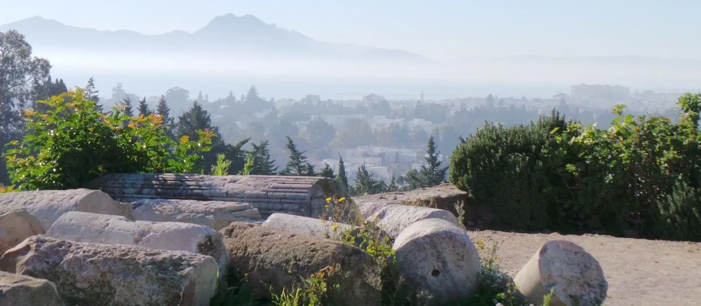 Ruins scattered on the hillside at Carthage in morning haze