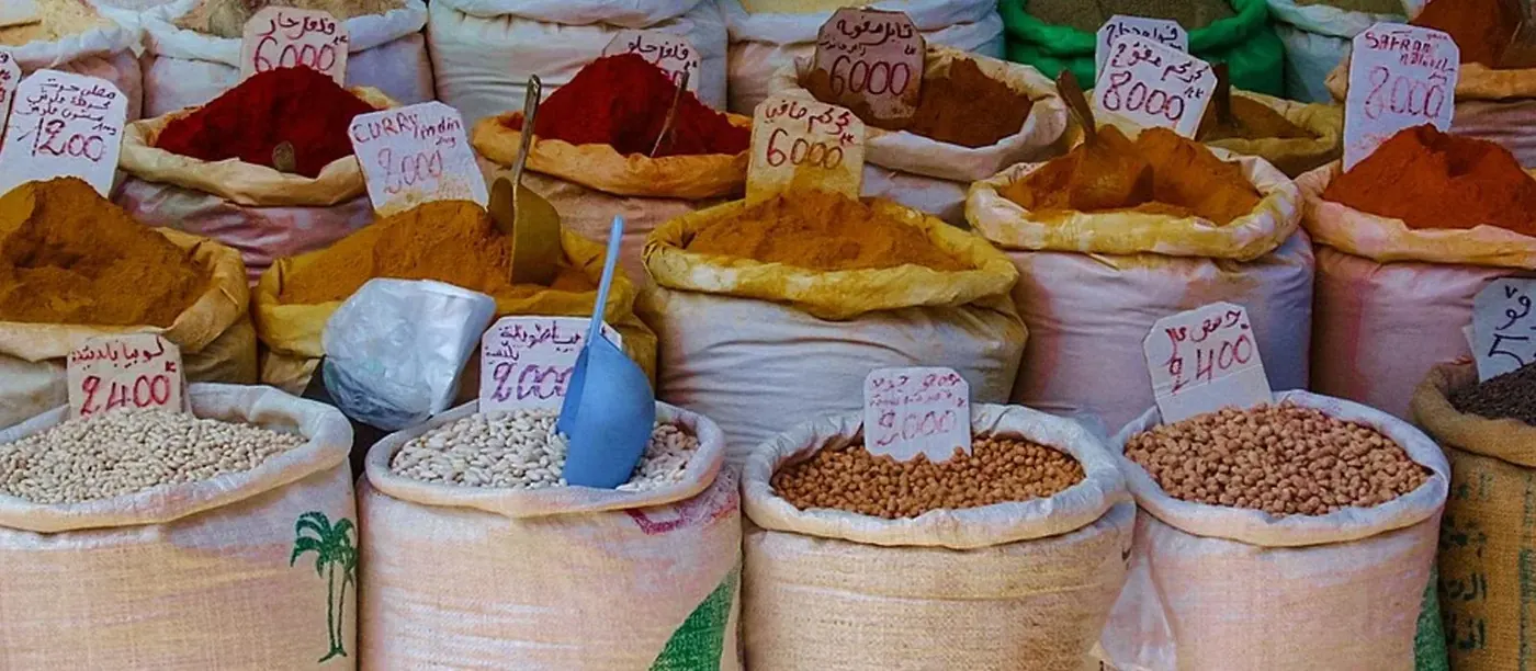 Open sacks of spices on a stall in the Tunis souk